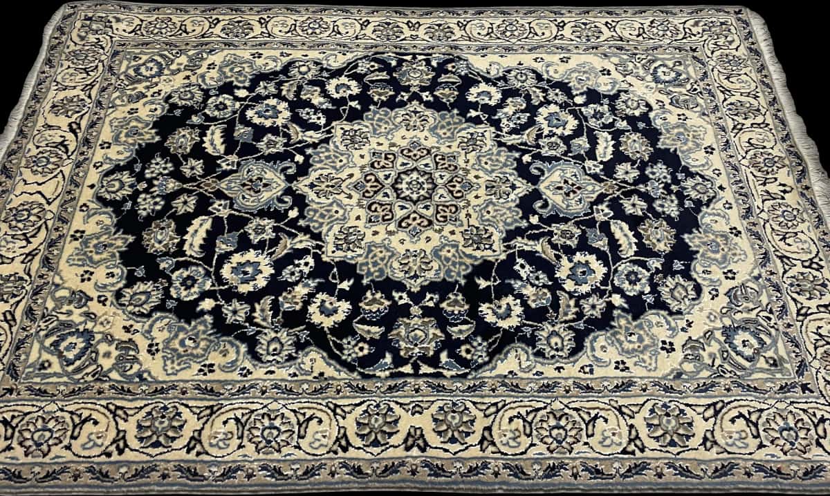 Persian rug of Nain style in dimensions 209 centimeters length by 140 centimeters width with mainly blue colors — Perspective