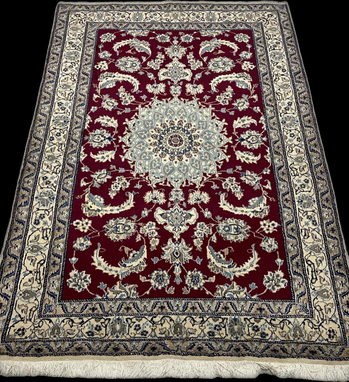 Persian rug of Nain style in dimensions 203 centimeters length by 145 centimeters width with mainly red colors — Perspective