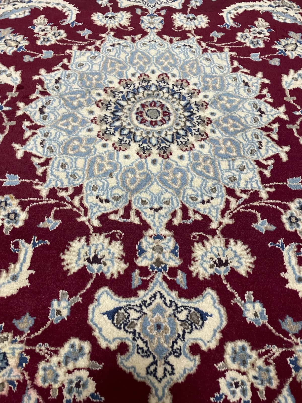 Persian rug of Nain style in dimensions 203 centimeters length by 145 centimeters width with mainly red colors — Perspective