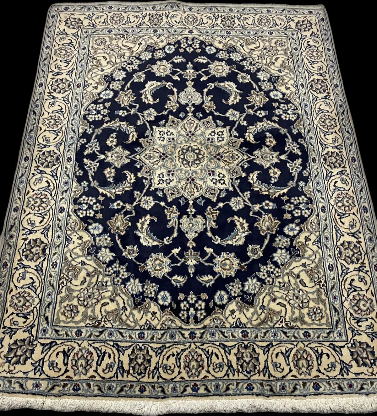 Persian rug of Nain style in dimensions 195 centimeters length by 146 centimeters width with mainly blue colors — Perspective
