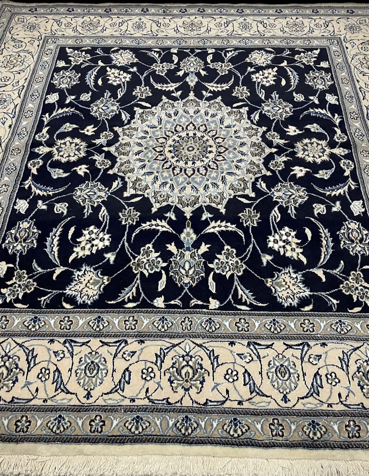 Persian rug of Nain style in dimensions 202 centimeters length by 198 centimeters width with mainly blue colors — Perspective