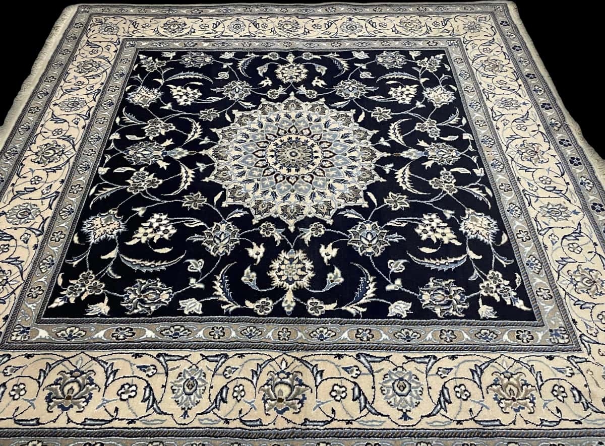 Persian rug of Nain style in dimensions 202 centimeters length by 198 centimeters width with mainly blue colors — Perspective