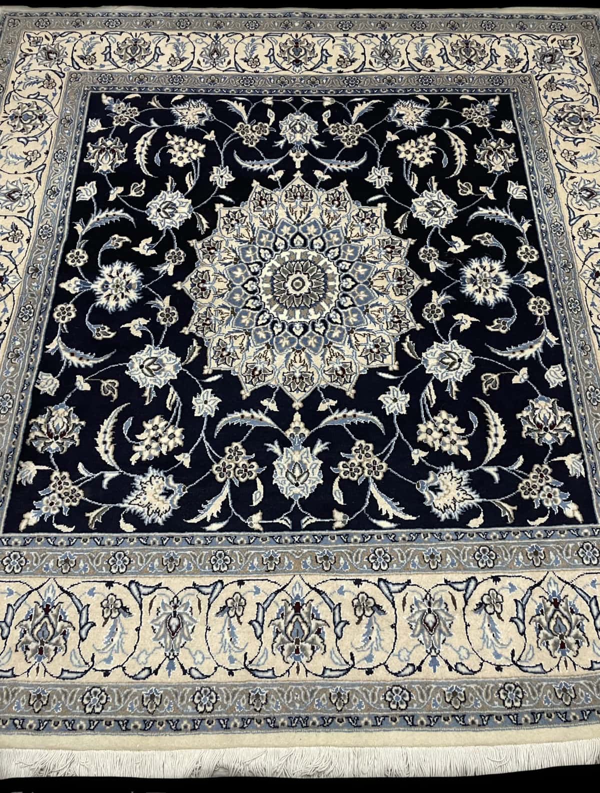 Persian rug of Nain style in dimensions 207 centimeters length by 200 centimeters width with mainly blue colors — Perspective