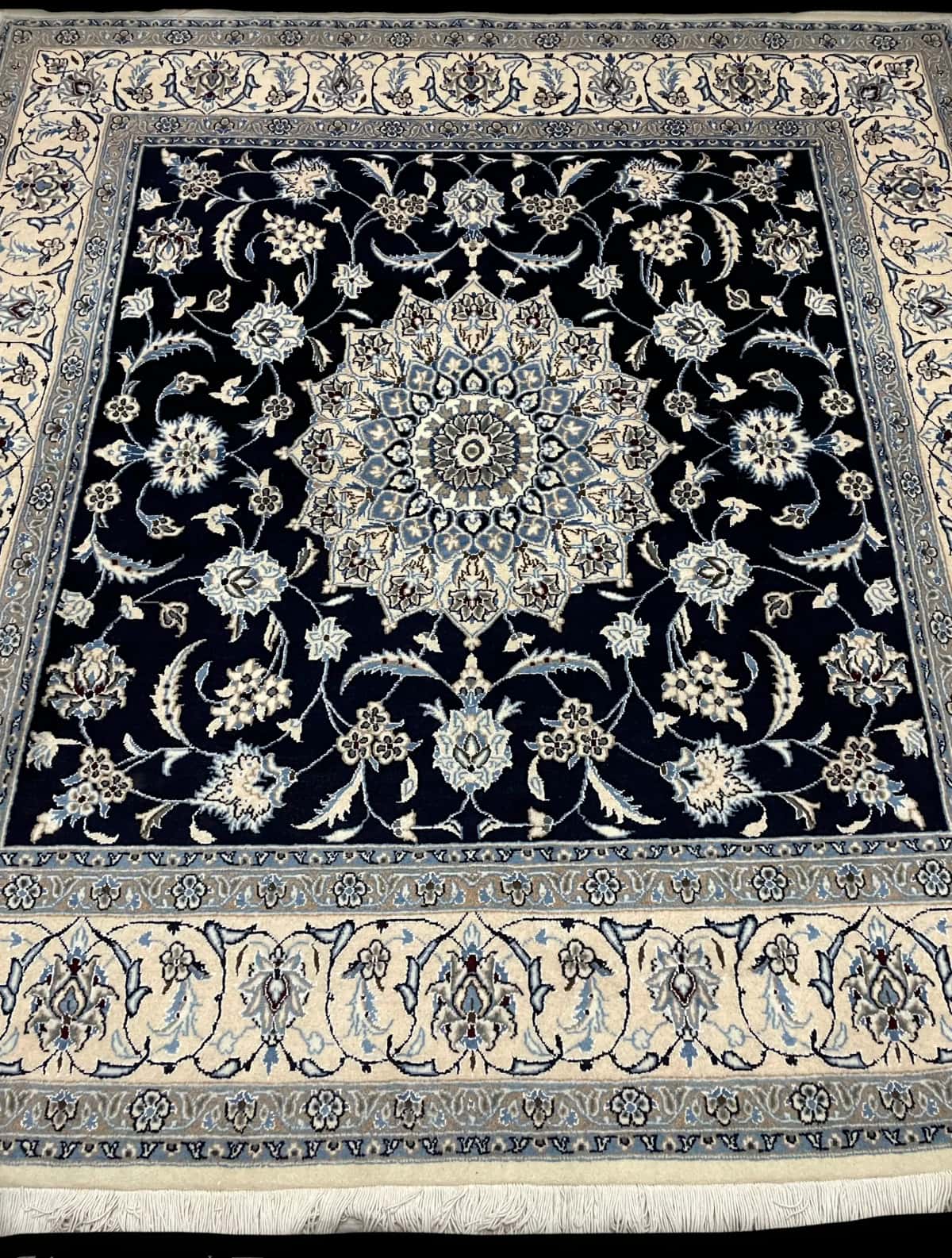 Persian rug of Nain style in dimensions 207 centimeters length by 200 centimeters width with mainly blue colors — Perspective