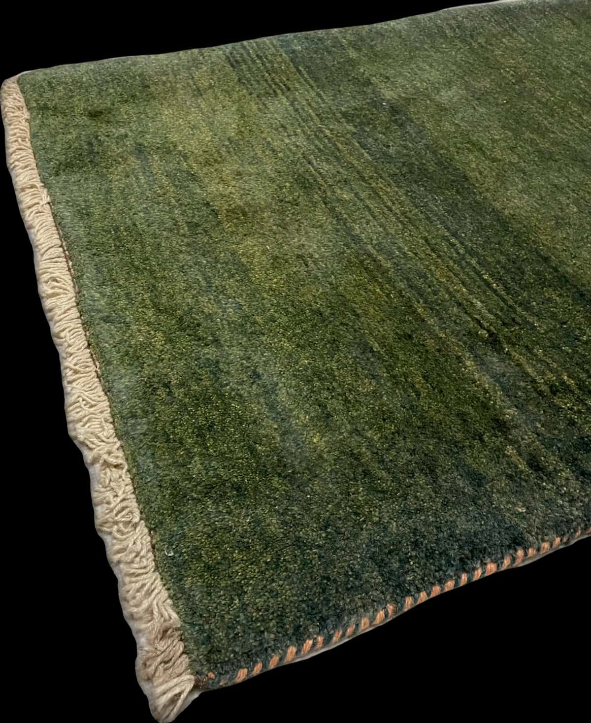 Persian rug of Gabbeh style in dimensions 122 centimeters length by 90 centimeters width with mainly green colors — Corner & edge