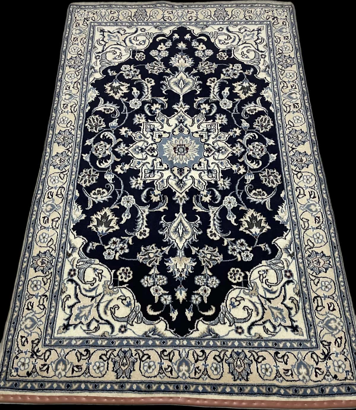 Persian rug of Nain style in dimensions 204 centimeters length by 125 centimeters width with mainly blue colors — Perspective