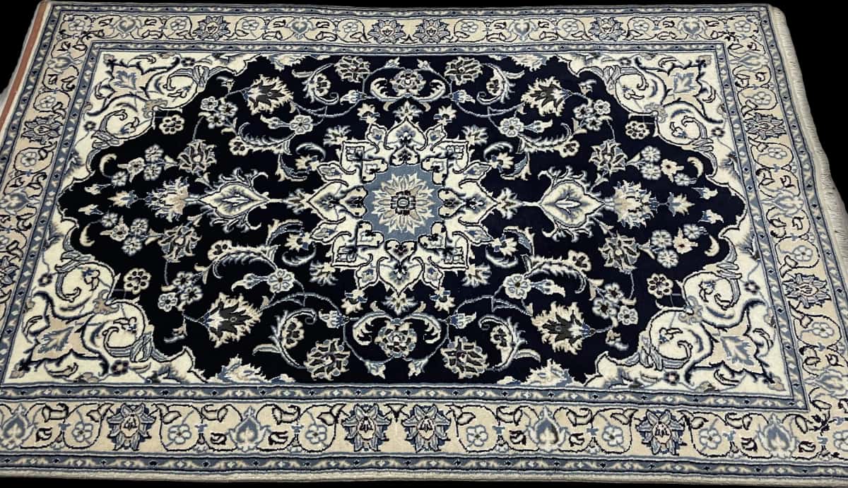 Persian rug of Nain style in dimensions 204 centimeters length by 125 centimeters width with mainly blue colors — Perspective
