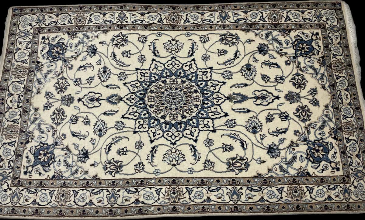 Persian rug of Nain style in dimensions 202 centimeters length by 120 centimeters width with mainly beige and blue colors — Perspective