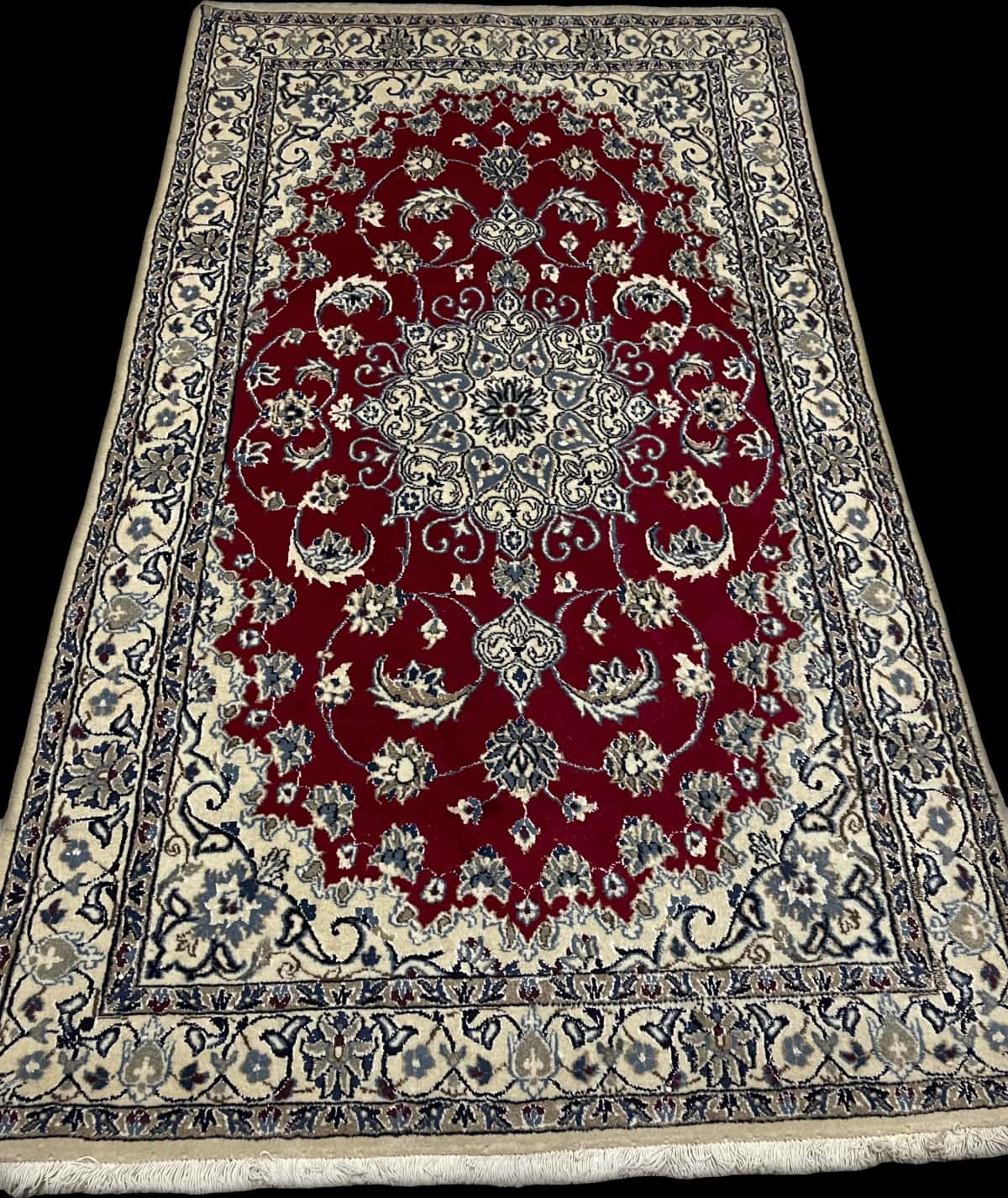 Persian rug of Nain style in dimensions 205 centimeters length by 117 centimeters width with mainly red colors — Perspective