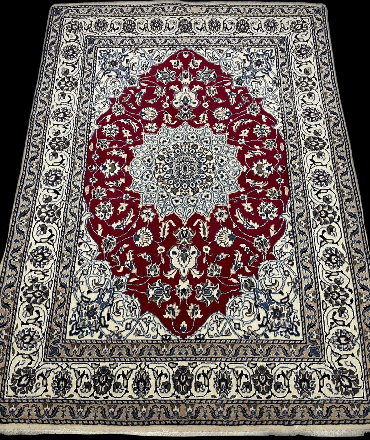 Persian rug of Nain style in dimensions 203 centimeters length by 140 centimeters width with mainly red and blue colors — Perspective