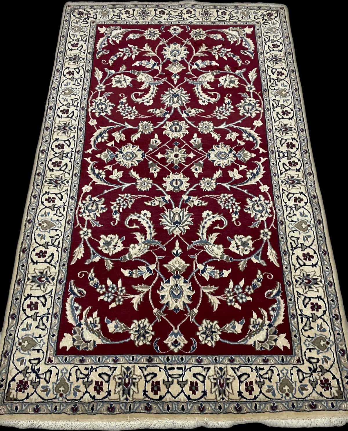 Persian rug of Nain style in dimensions 200 centimeters length by 118 centimeters width with mainly red colors — Perspective