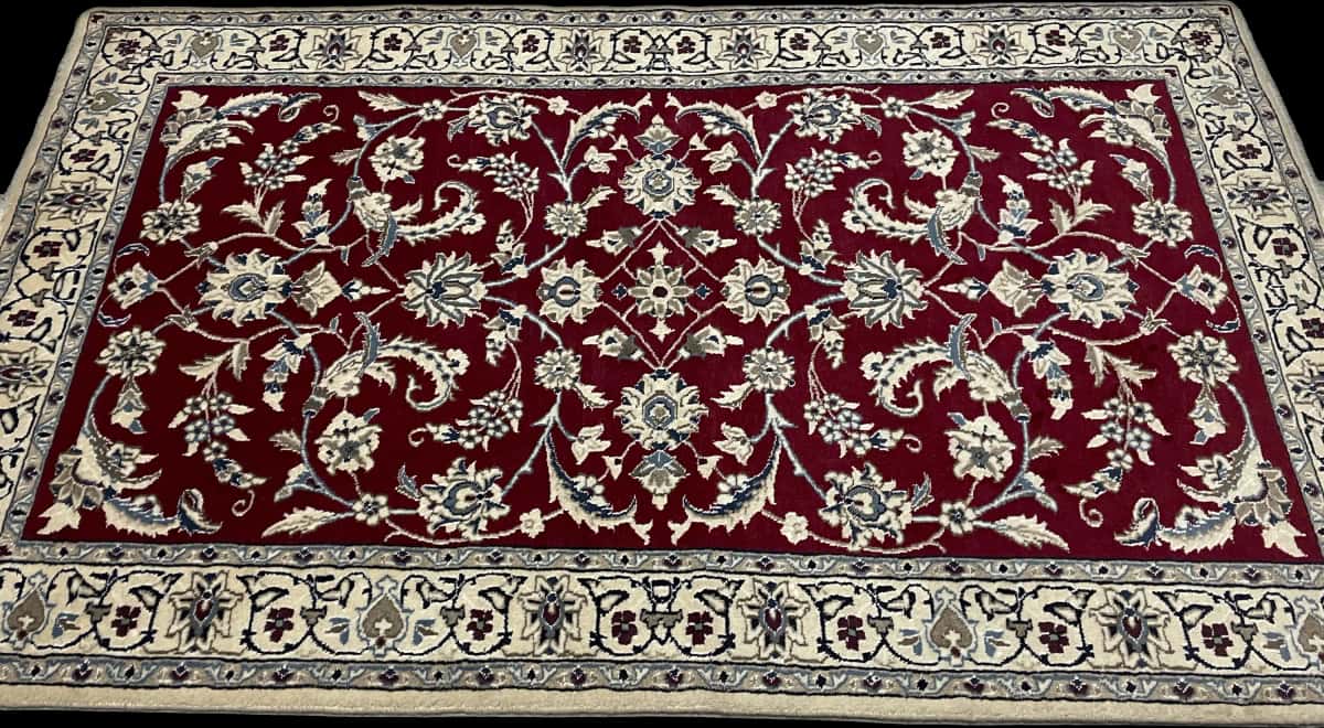 Persian rug of Nain style in dimensions 200 centimeters length by 118 centimeters width with mainly red colors — Perspective