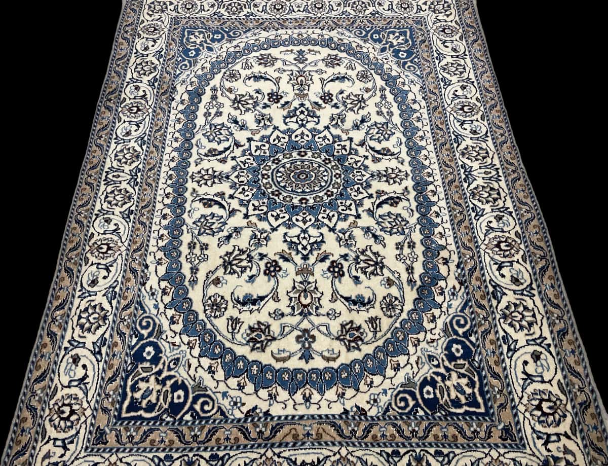 Persian rug of Nain style in dimensions 212 centimeters length by 148 centimeters width with mainly beige and blue colors — Perspective