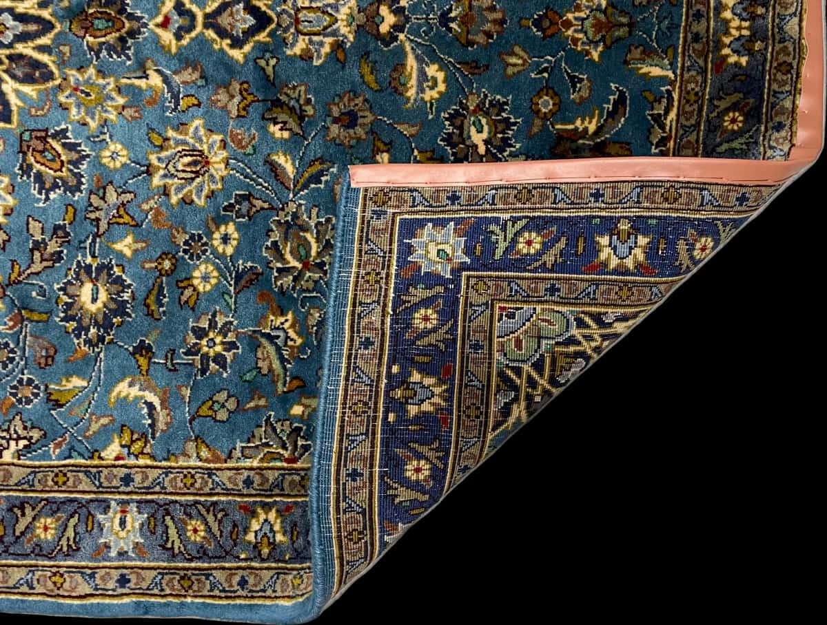 Persian rug of Kashmar style in dimensions 186 centimeters length by 126 centimeters width with mainly blue colors — Folded