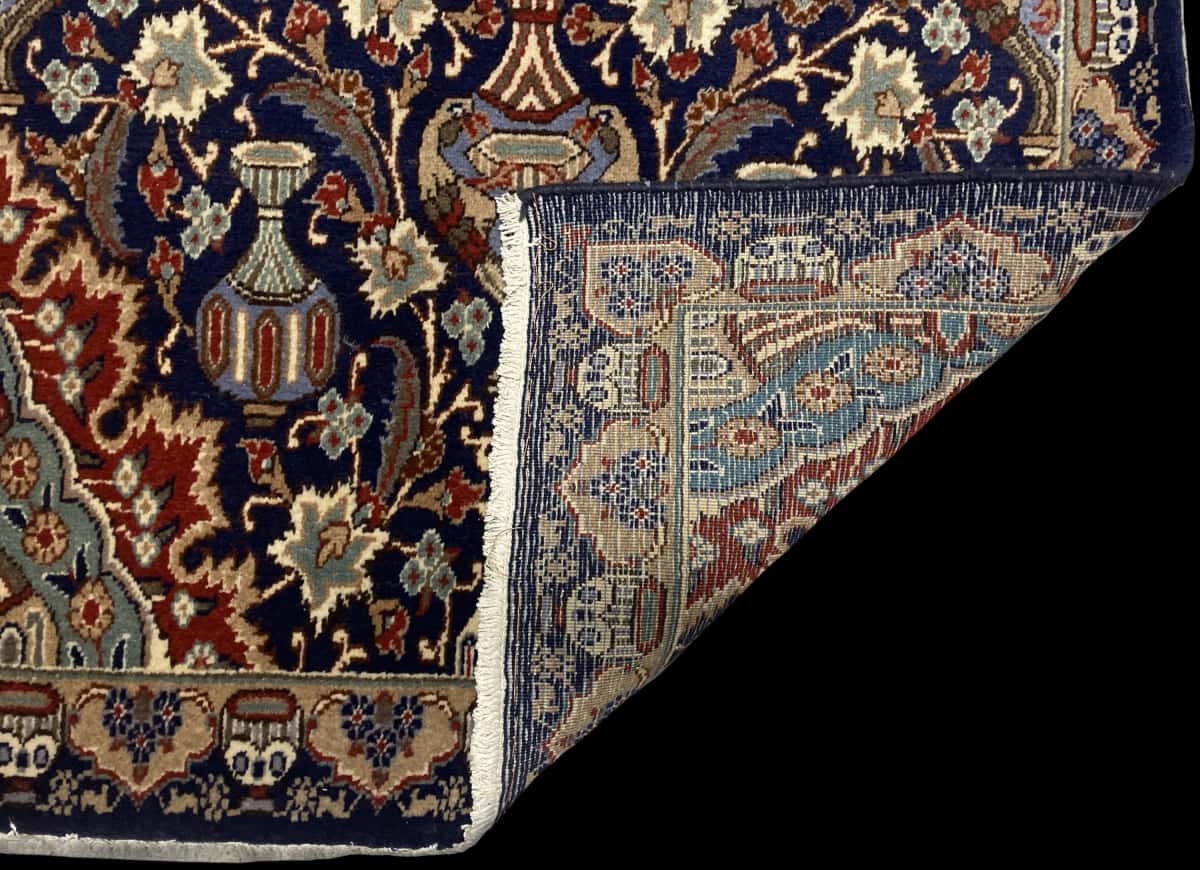 Persian rug of Kashmar style in dimensions 210 centimeters length by 106 centimeters width with mainly blue colors — Folded
