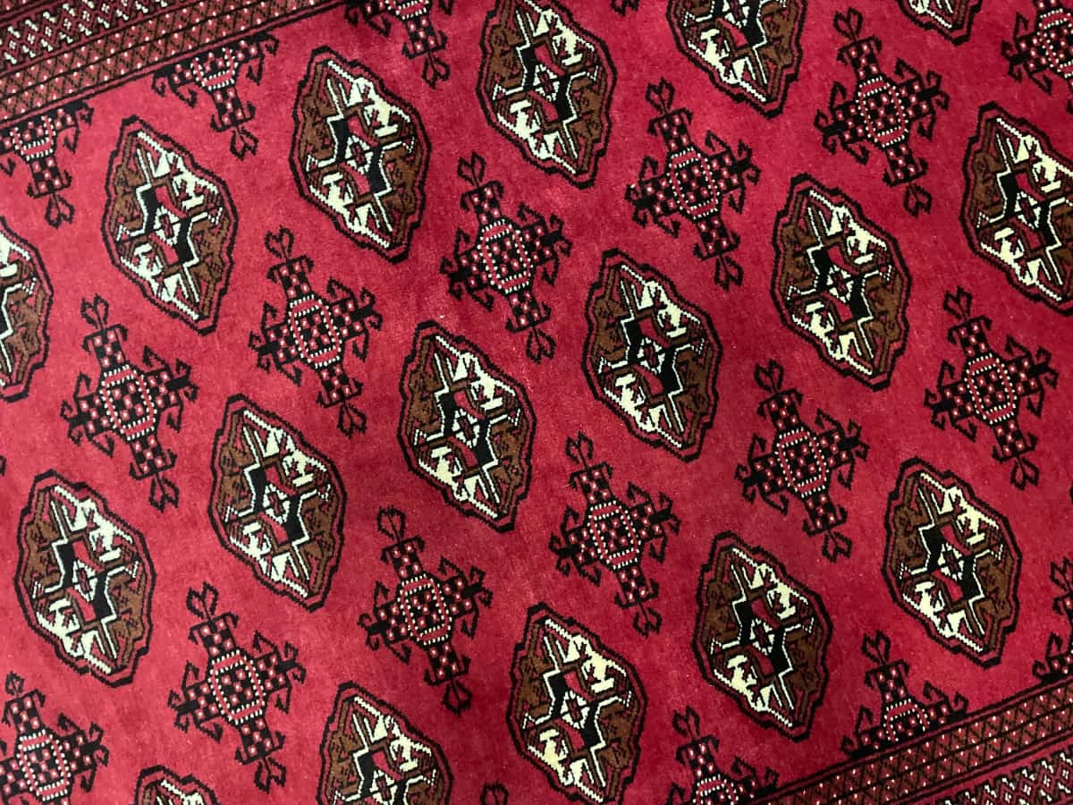 Persian Turkoman rug, oriental, 132x203 cm, mainly red — Texture close-up