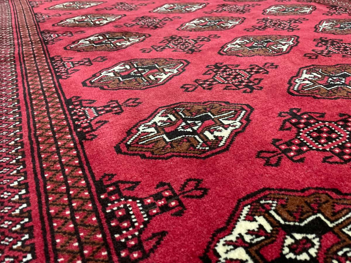 Persian Turkoman rug, oriental, 132x203 cm, mainly red — Texture close-up