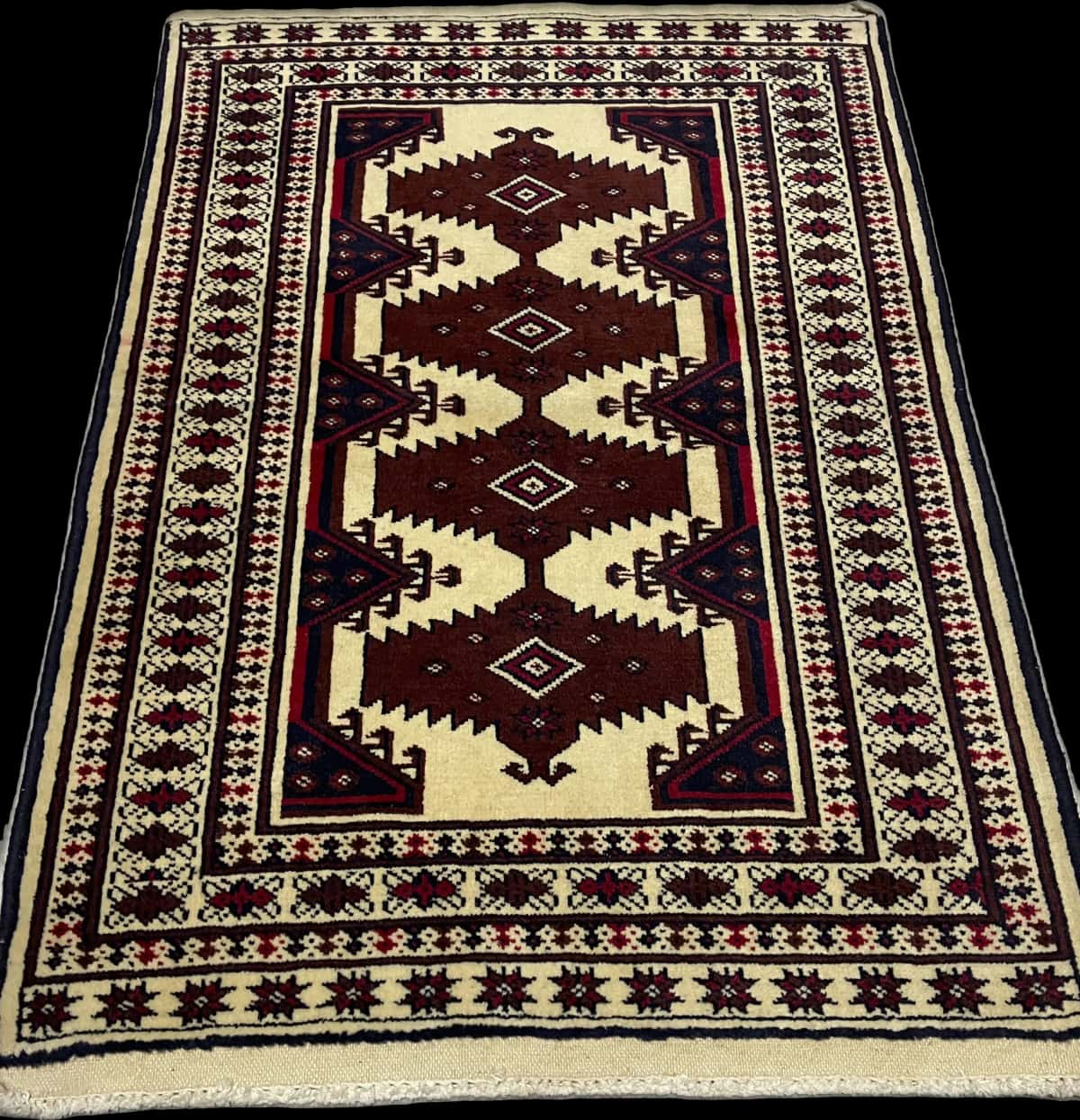 Persian rug in dimensions 112 centimeters length by 79 centimeters width with mainly beige and brown colors — Perspective
