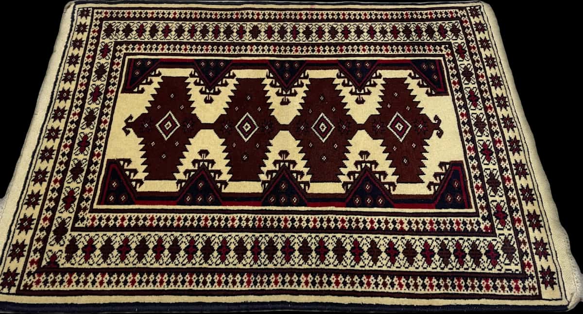 Persian rug in dimensions 112 centimeters length by 79 centimeters width with mainly beige and brown colors — Perspective