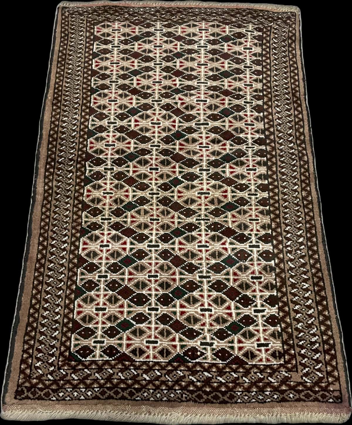 Persian rug of Turkoman style in dimensions 117 centimeters length by 76 centimeters width with mainly brown colors — Perspective