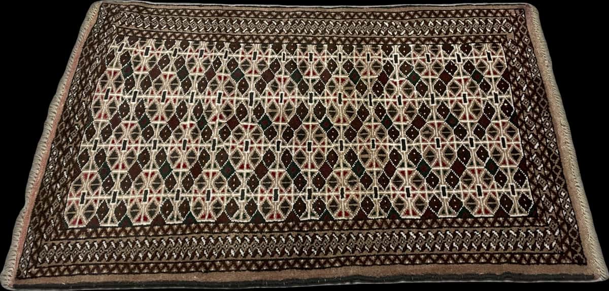 Persian rug of Turkoman style in dimensions 117 centimeters length by 76 centimeters width with mainly brown colors — Perspective