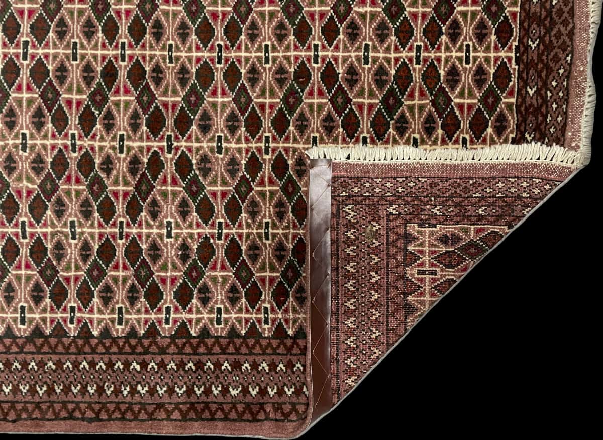 Persian rug of Turkoman style in dimensions 153 centimeters length by 97 centimeters width with mainly brown colors — Folded