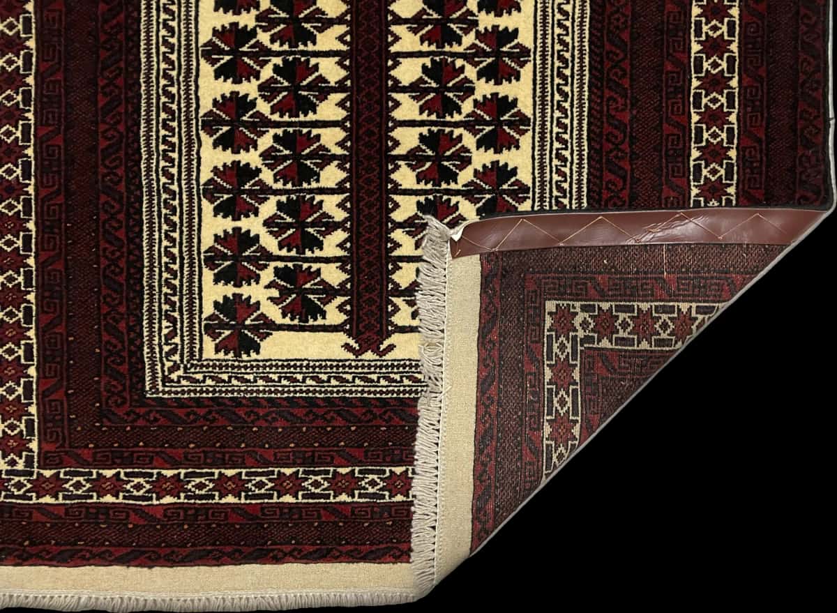 Persian rug of Turkoman style in dimensions 158 centimeters length by 106 centimeters width with mainly red colors — Folded