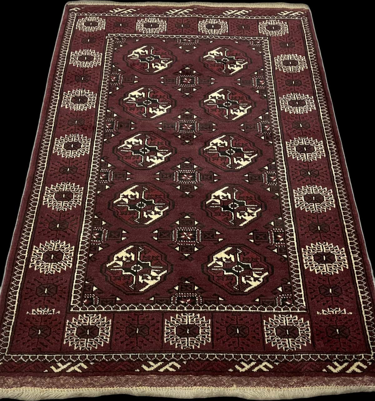 Persian rug of Turkoman style in dimensions 146 centimeters length by 100 centimeters width with mainly brown colors — Perspective