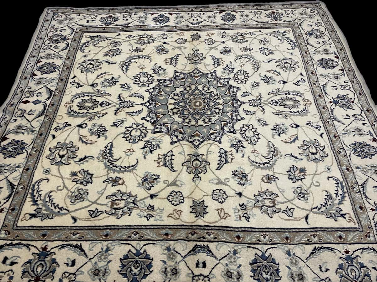 Persian rug of Nain style in dimensions 205 centimeters length by 200 centimeters width with mainly beige colors — Perspective