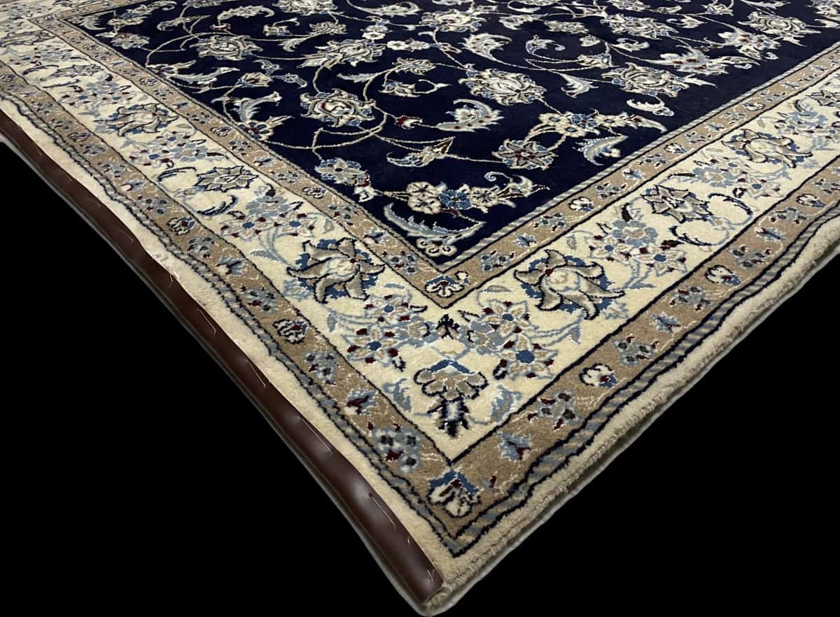 Persian rug of Nain style in dimensions 234 centimeters length by 168 centimeters width with mainly blue colors — Corner & edge