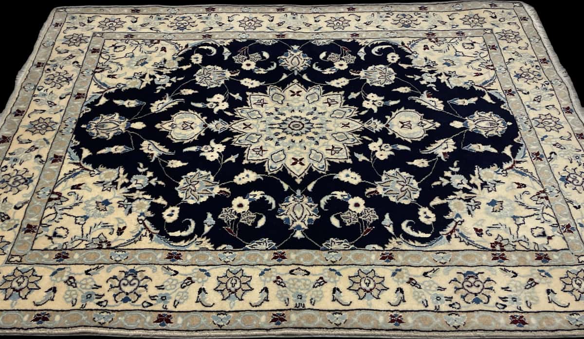 Persian rug of Nain style in dimensions 214 centimeters length by 148 centimeters width with mainly beige and blue colors — Perspective