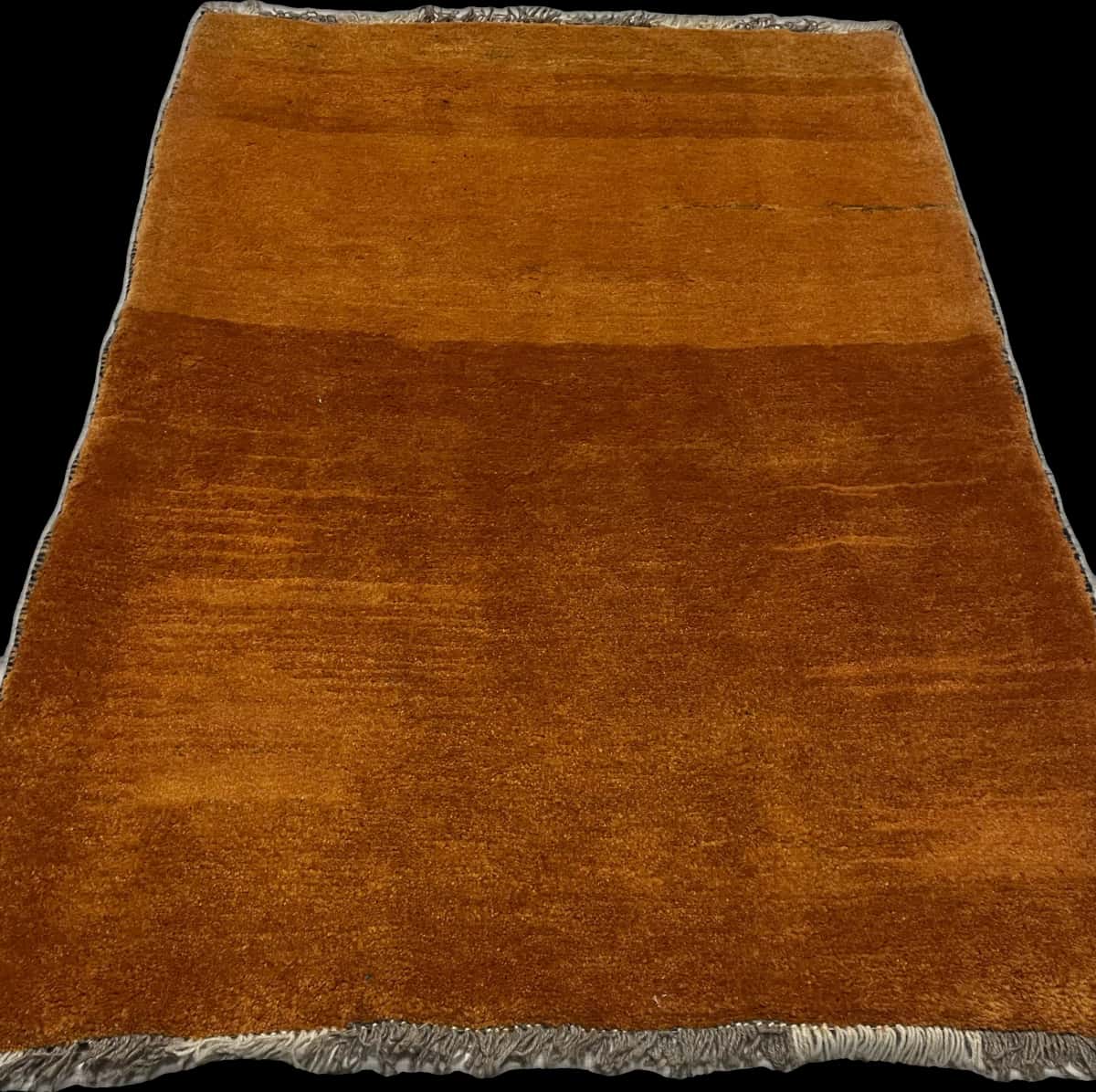Persian rug of Gabbeh style in dimensions 150 centimeters length by 106 centimeters width with mainly orange colors — Perspective