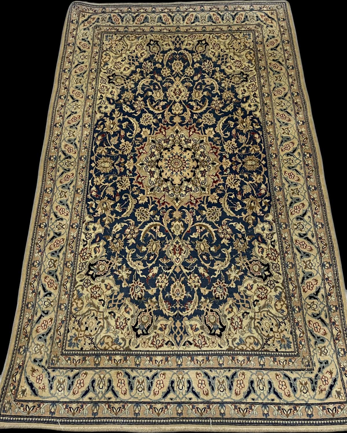 Persian rug of Nain style in dimensions 203 centimeters length by 122 centimeters width with mainly blue colors — Perspective