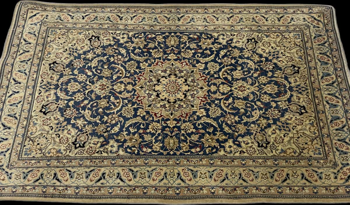 Persian rug of Nain style in dimensions 203 centimeters length by 122 centimeters width with mainly blue colors — Perspective