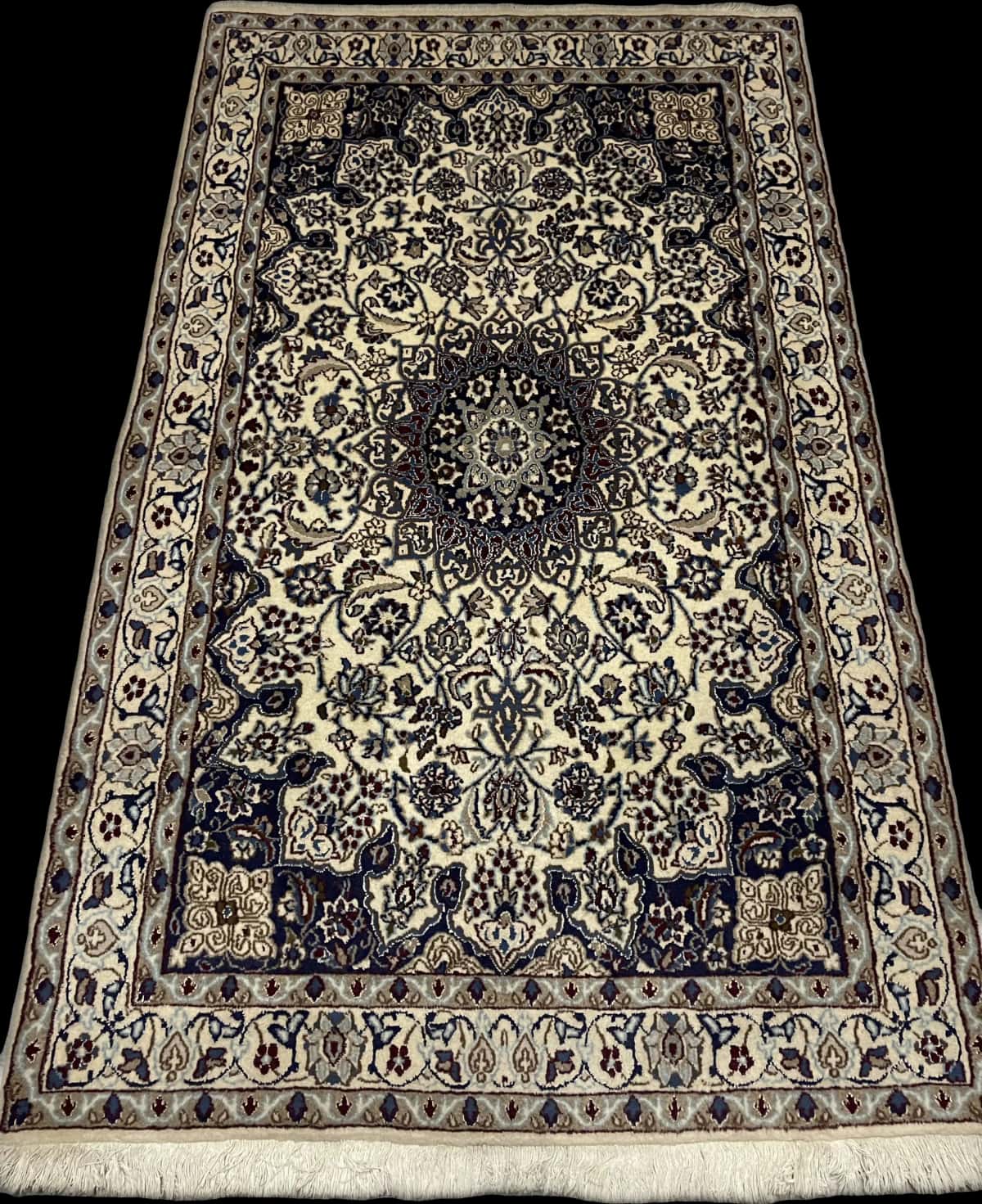 Persian rug in dimensions 202 centimeters length by 122 centimeters width with mainly blue and beige colors — Perspective