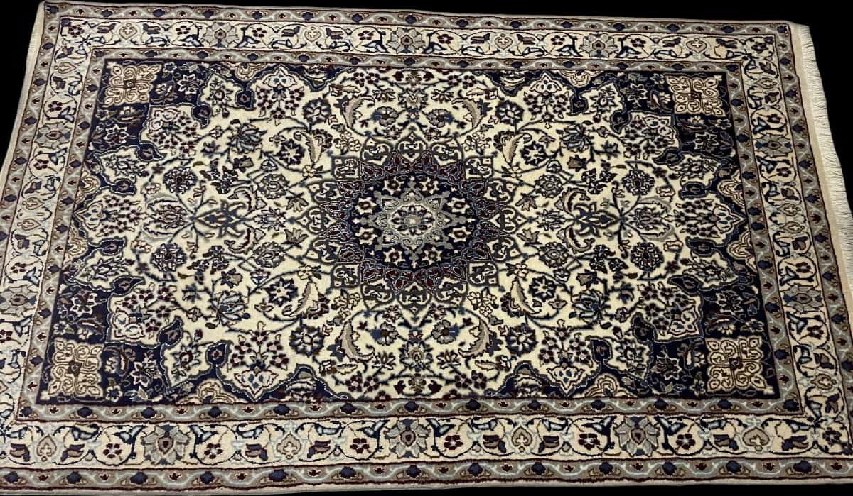 Persian rug in dimensions 202 centimeters length by 122 centimeters width with mainly blue and beige colors — Perspective