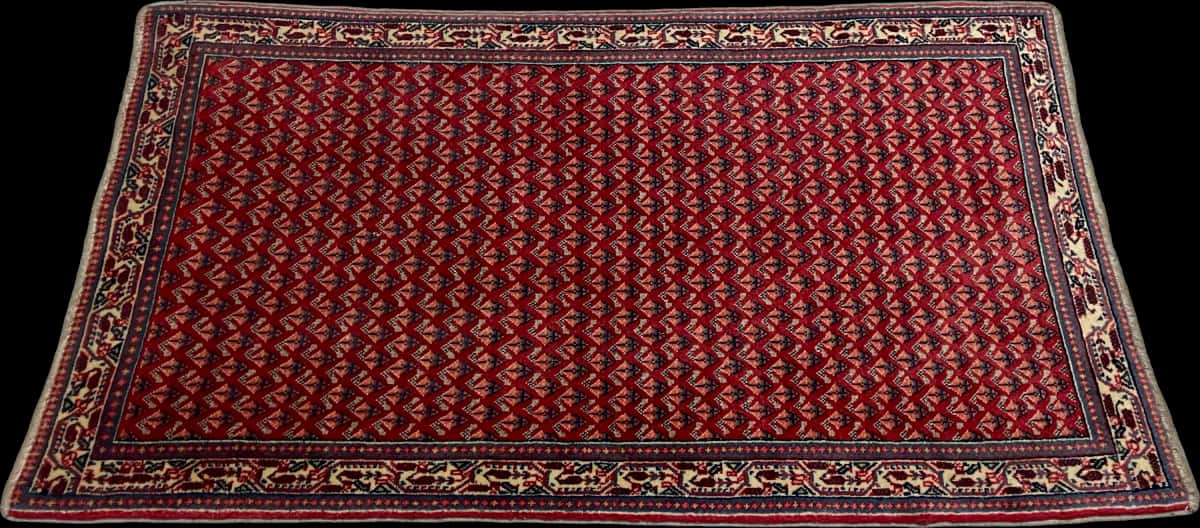 persischer Teppich im Arak Stil in den Maßen 115 Zentimeter Länge mal 67 Zentimeter Breite mit überwiegend rot und blau Farben — Perspektive