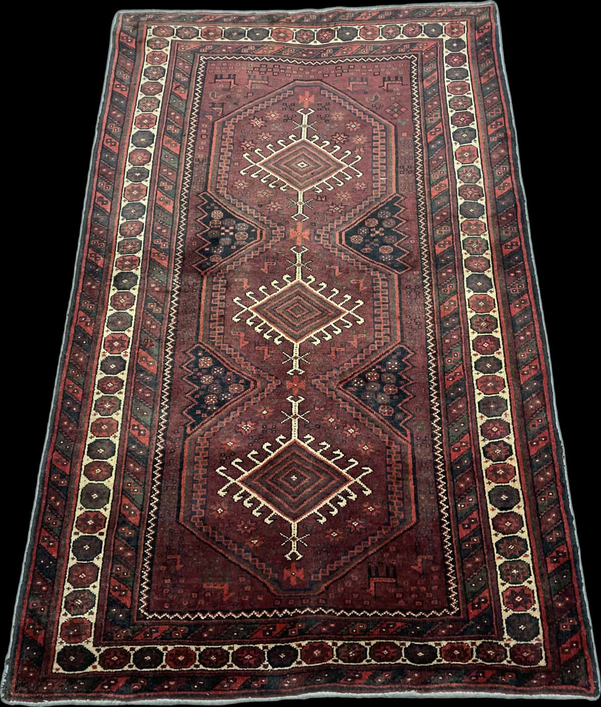 Persian rug of Baluch style in dimensions 205 centimeters length by 125 centimeters width with mainly red colors — Perspective
