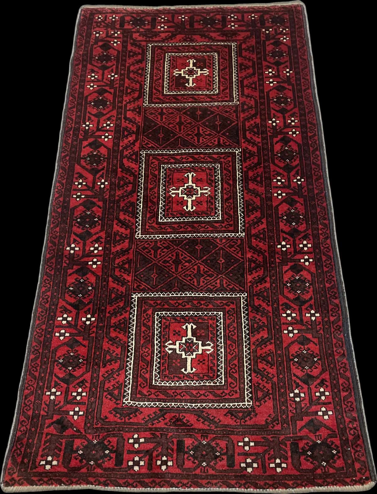 Persian rug of Baluch style in dimensions 208 centimeters length by 107 centimeters width with mainly red colors — Perspective