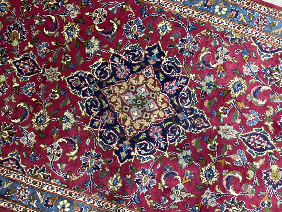 Persian rug of Kashmar style in dimensions 217 centimeters length by 110 centimeters width with mainly red and blue colors — Perspective