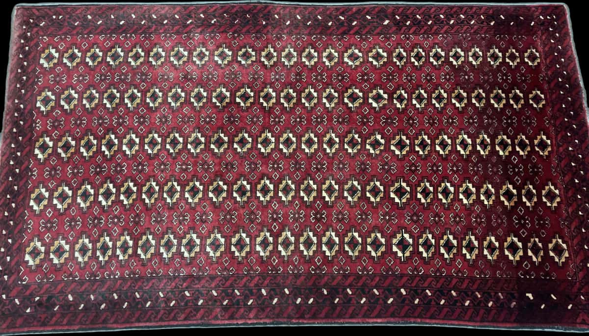 Persian rug of Baluch style in dimensions 204 centimeters length by 116 centimeters width with mainly red colors — Perspective