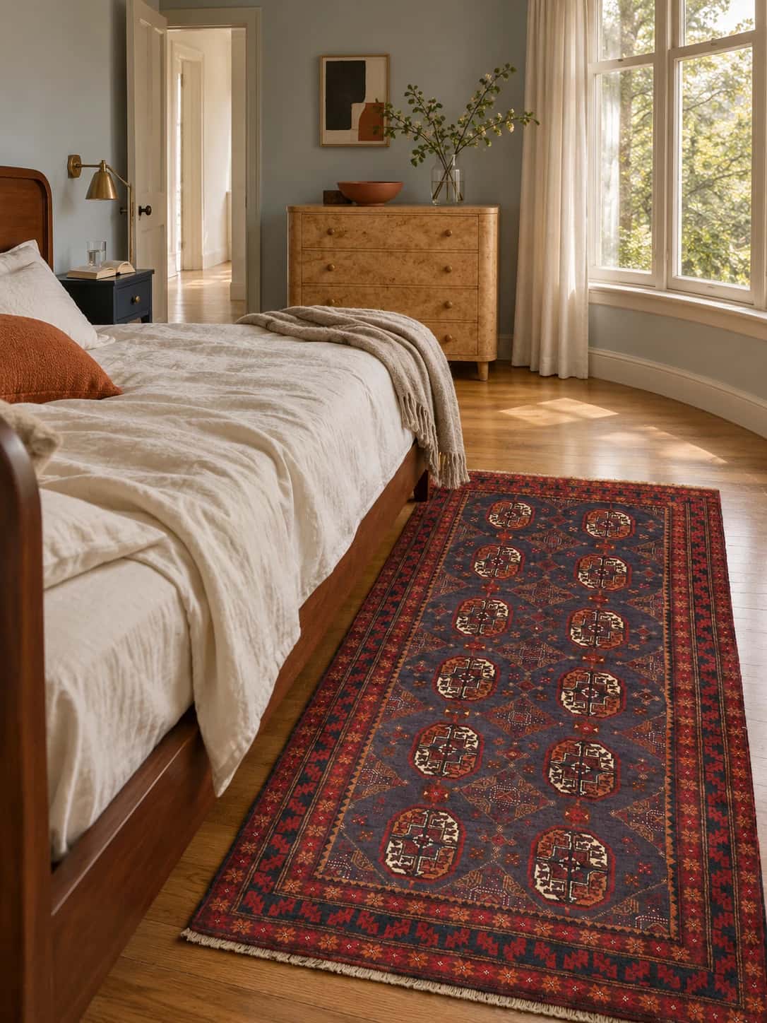 Persian Baluch rug, oriental, 116x188 cm, mainly red — In a room