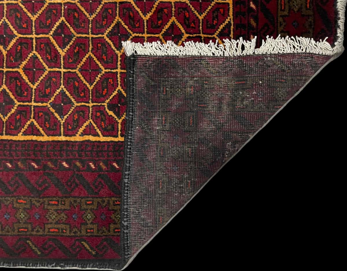 Persian rug of Turkoman style in dimensions 174 centimeters length by 97 centimeters width with mainly red colors — Folded