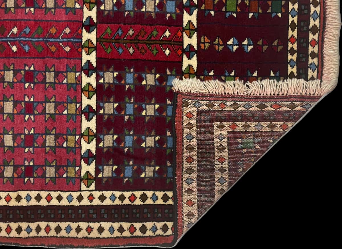 Persian rug of Quchan style in dimensions 171 centimeters length by 118 centimeters width with mainly red and brown colors — Folded