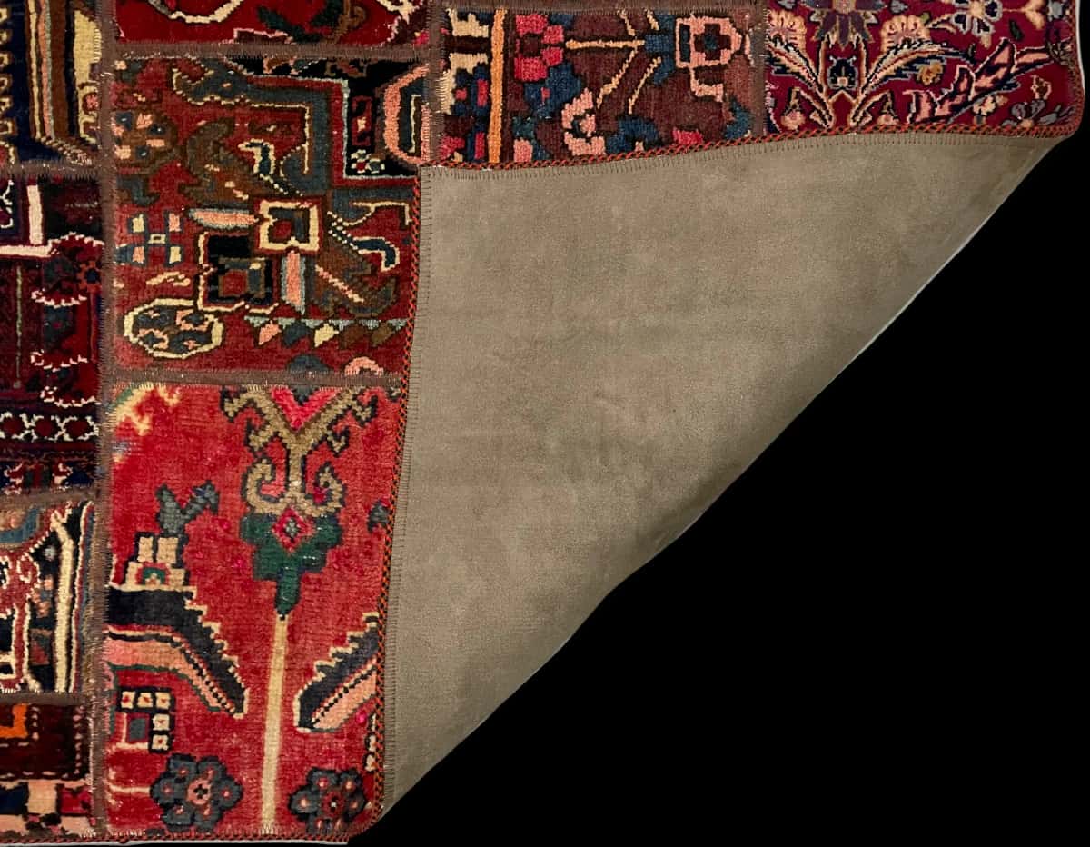 Persian rug of Rey style in dimensions 207 centimeters length by 136 centimeters width with mainly red and blue colors — Folded