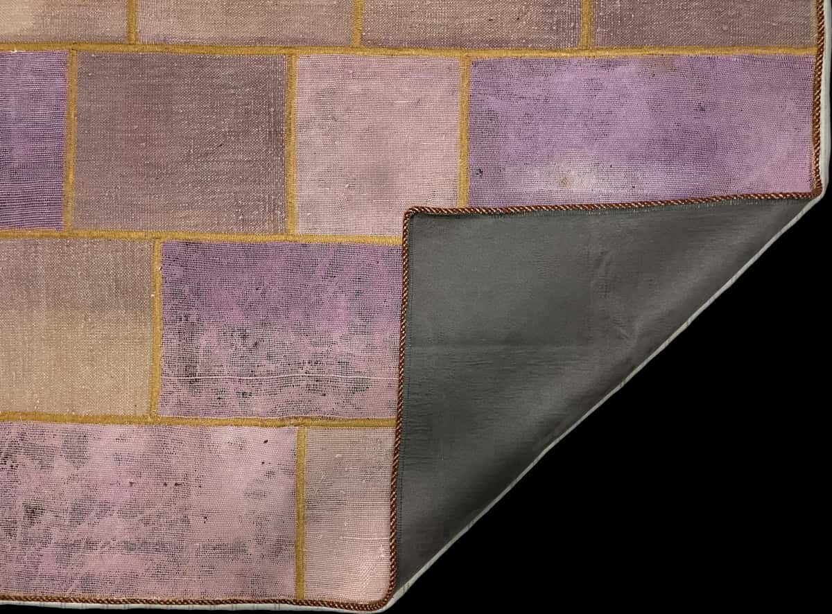 Persian rug of Rey style in dimensions 165 centimeters length by 119 centimeters width with mainly purple colors — Folded