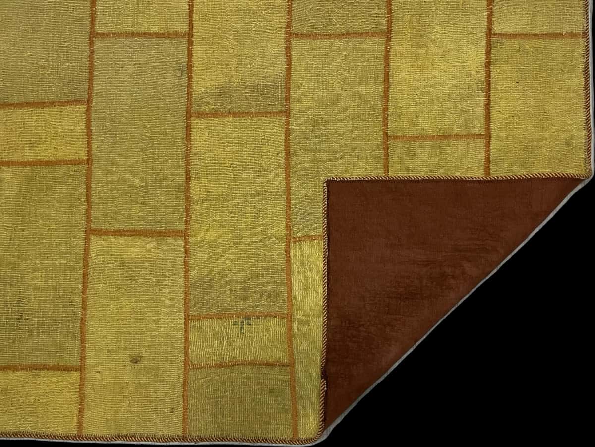 Persian rug of Rey style in dimensions 195 centimeters length by 140 centimeters width with mainly yellow colors — Folded