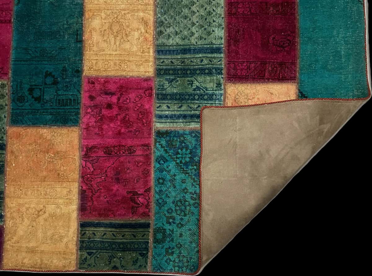 Persian rug of Patchwork style in dimensions 208 centimeters length by 138 centimeters width with mainly turquoise and red colors — Folded