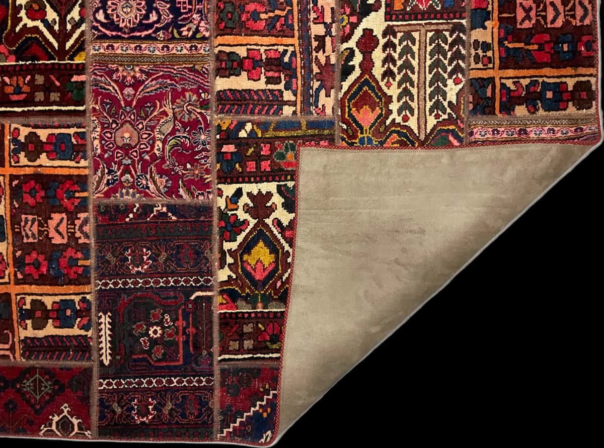 Persian rug of Rey style in dimensions 210 centimeters length by 139 centimeters width with mainly red colors — Folded
