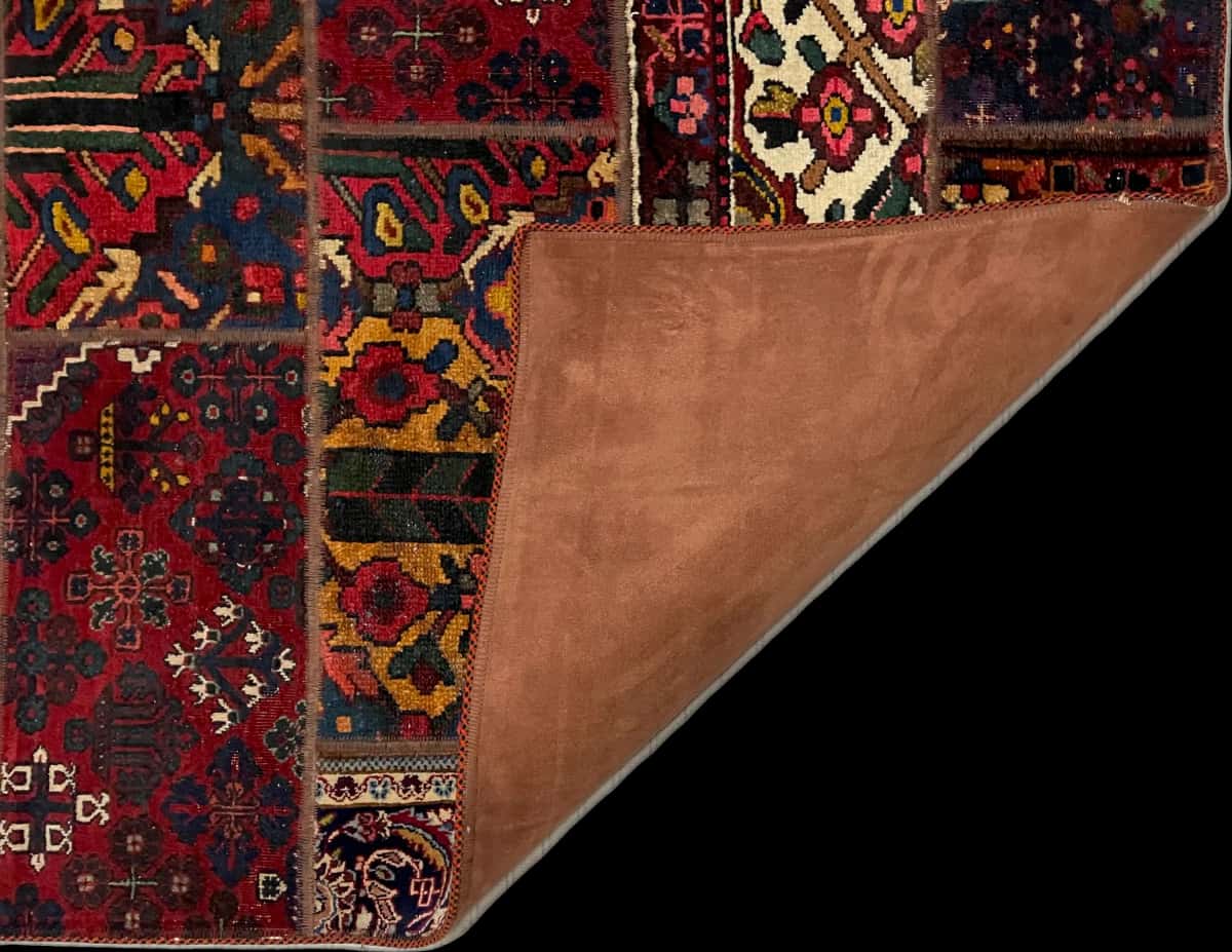 Persian rug of Rey style in dimensions 207 centimeters length by 136 centimeters width with mainly red colors — Folded